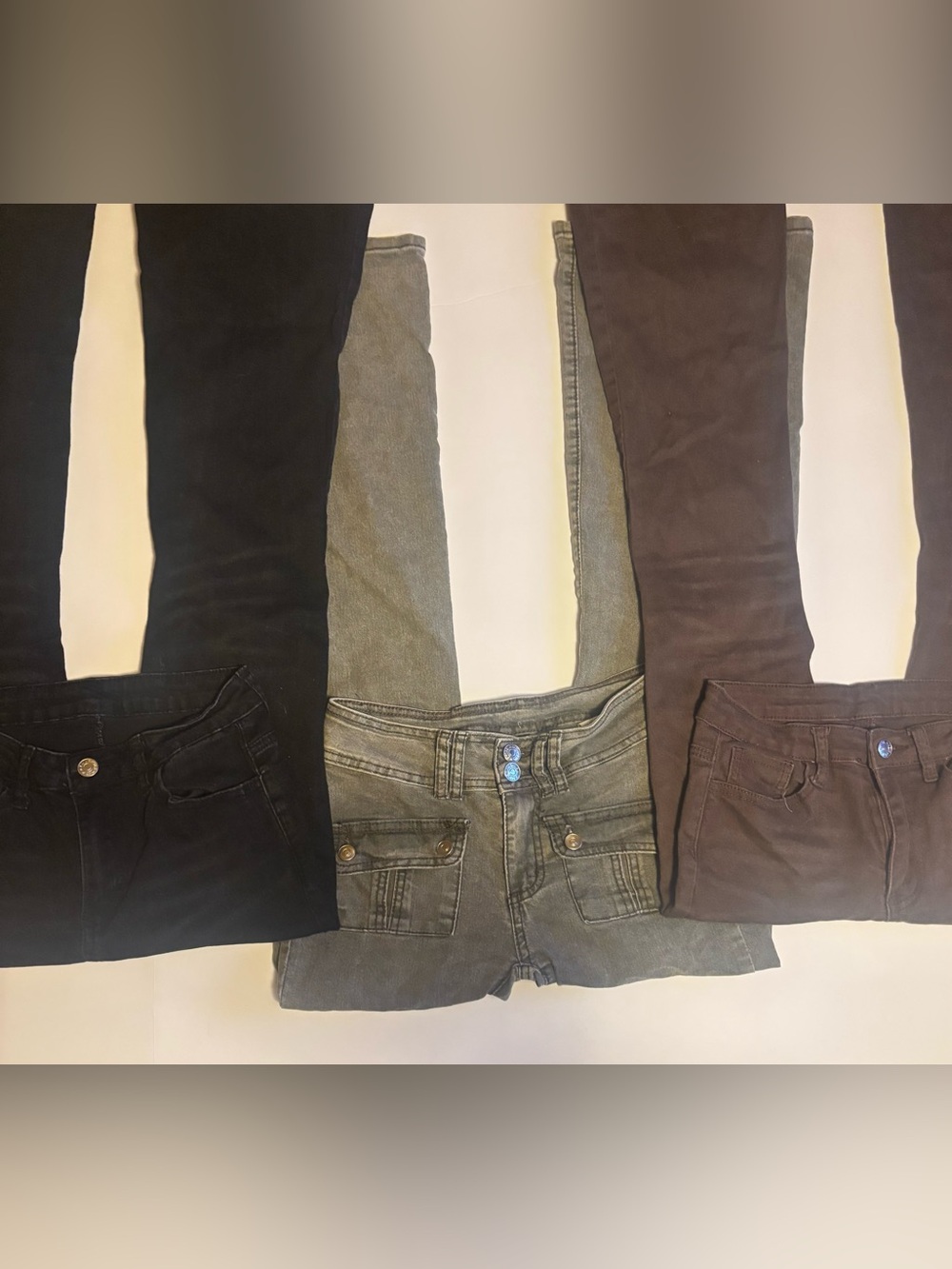 Three Pairs of Women's Flared Skinny Jeans - Black, Olive Green, Brown.
